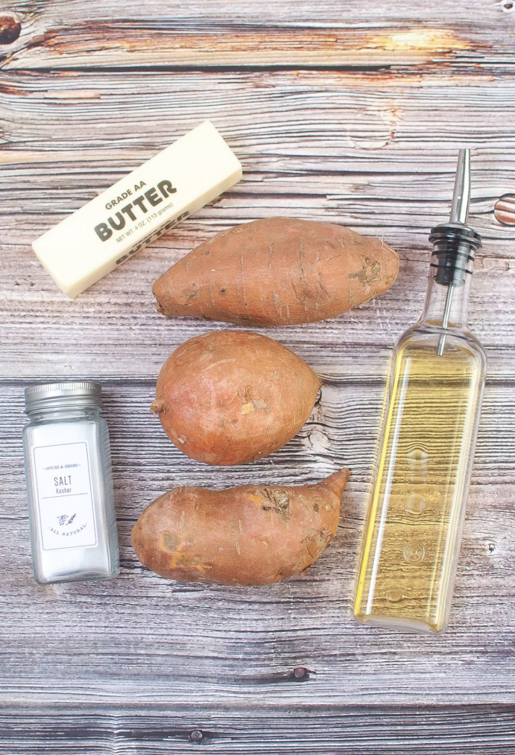 Sweet potato butter recipe ingredients on a wooden table.