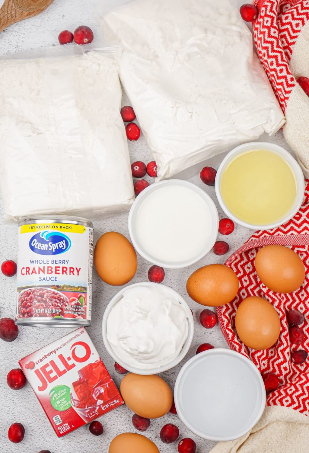 The ingredients for cranberry cranberry pancakes are laid out on a table.