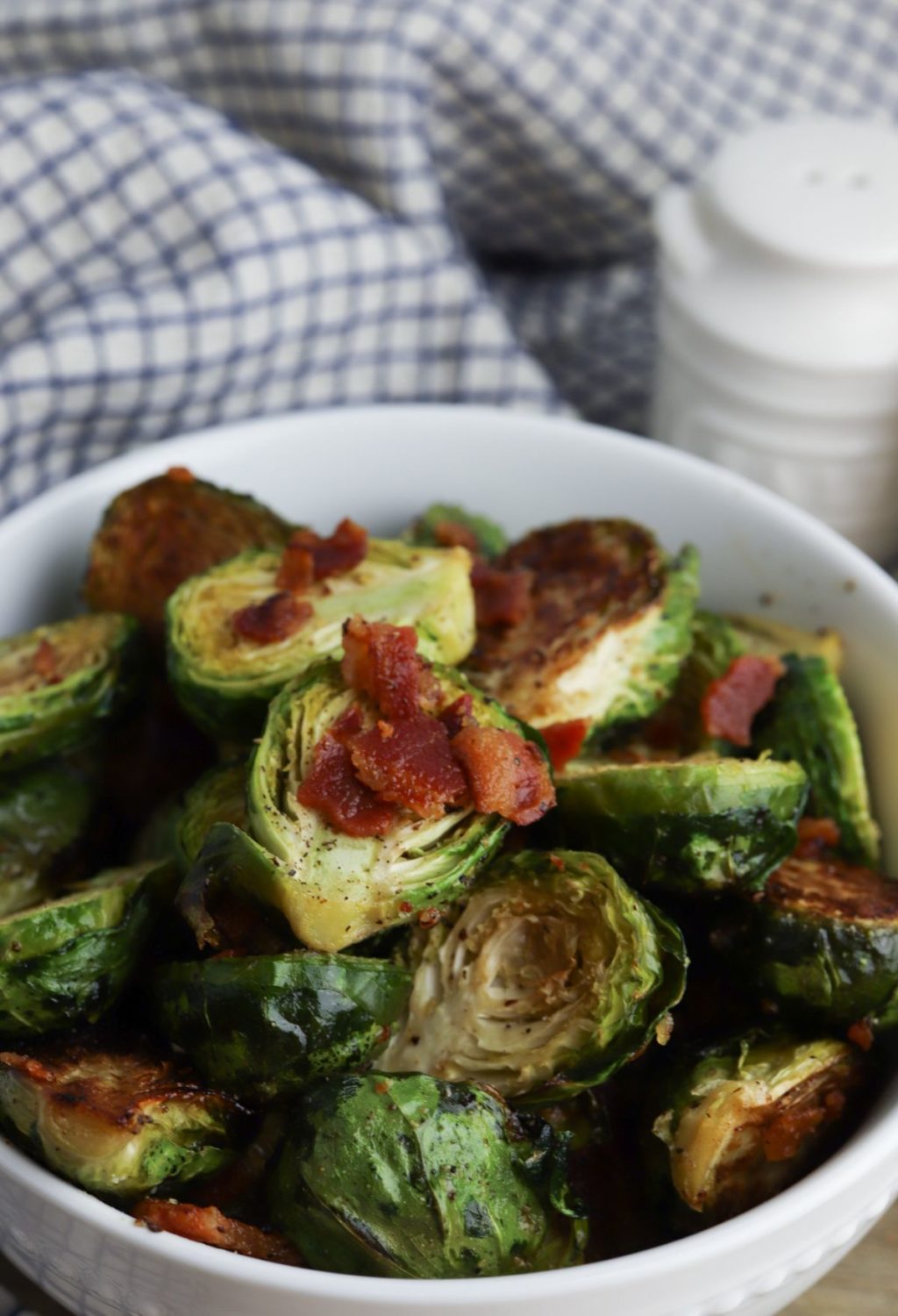 Roasted brussels sprouts with bacon in a bowl.
