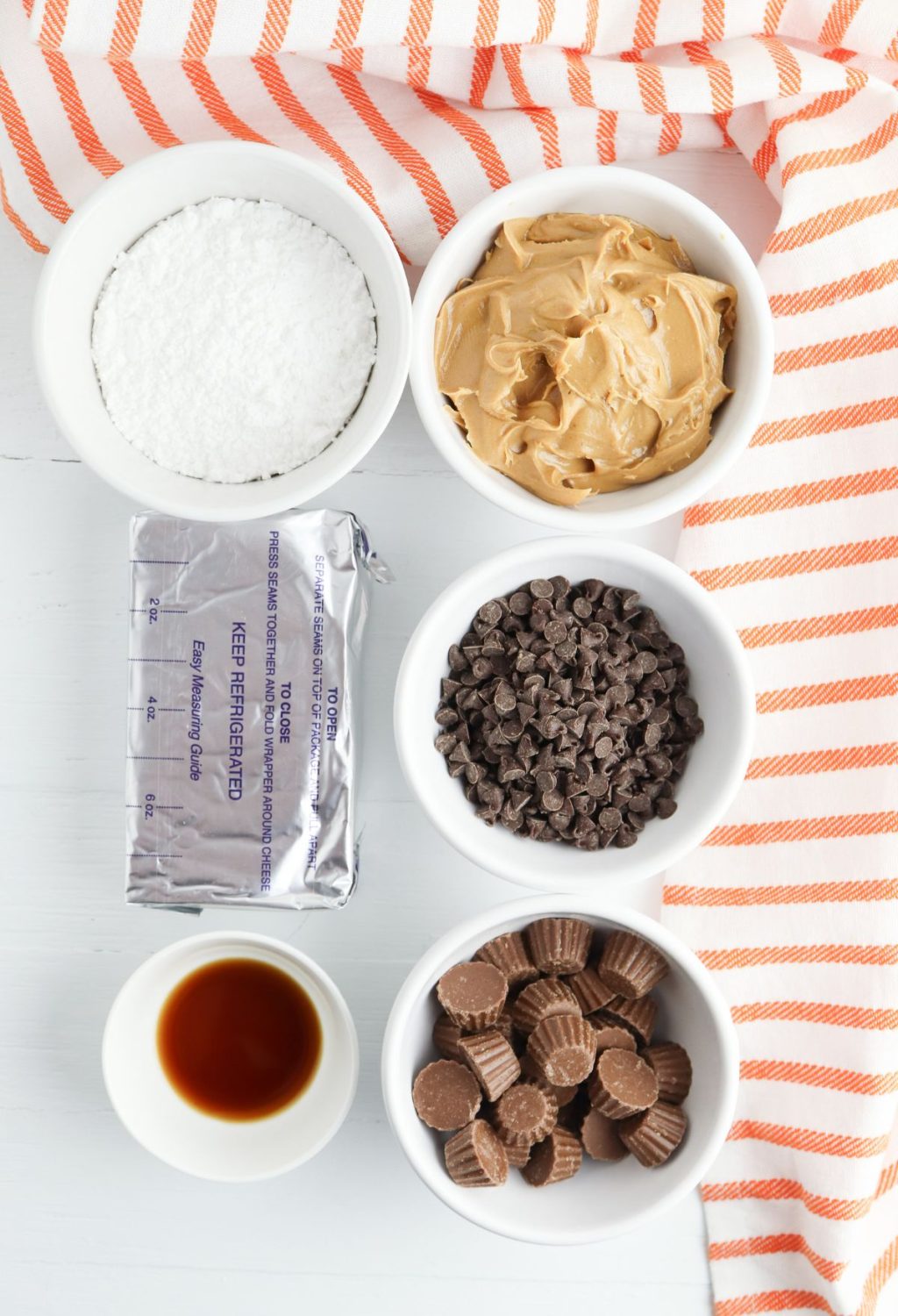 Peanut butter cookie ingredients on a white table.