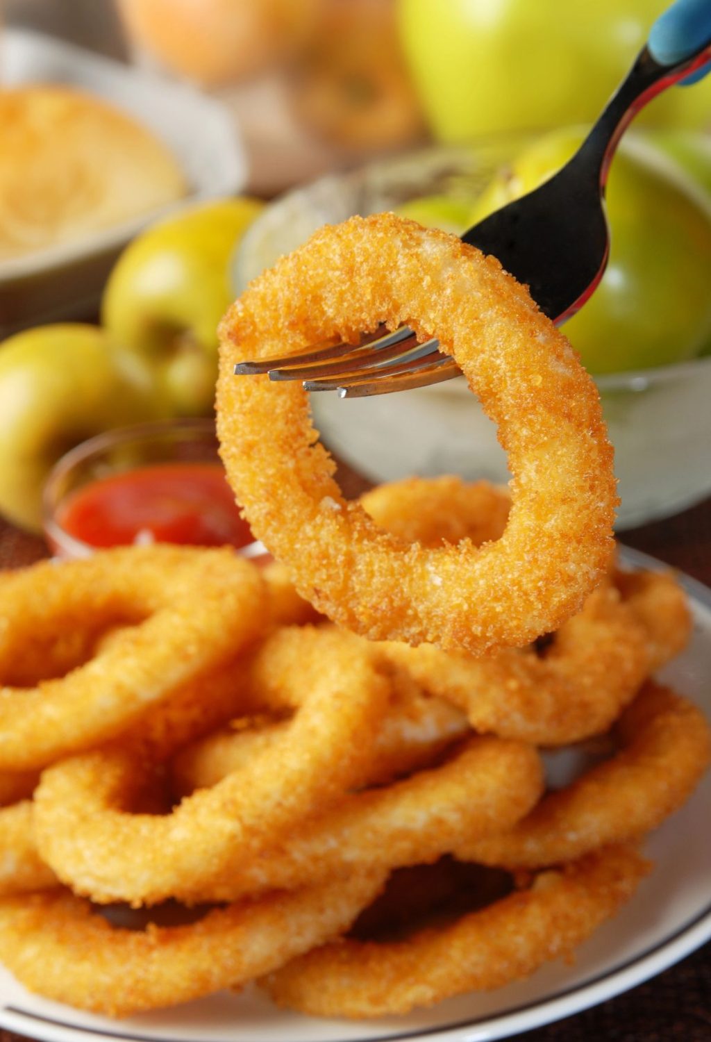 Fried onion rings on a plate.