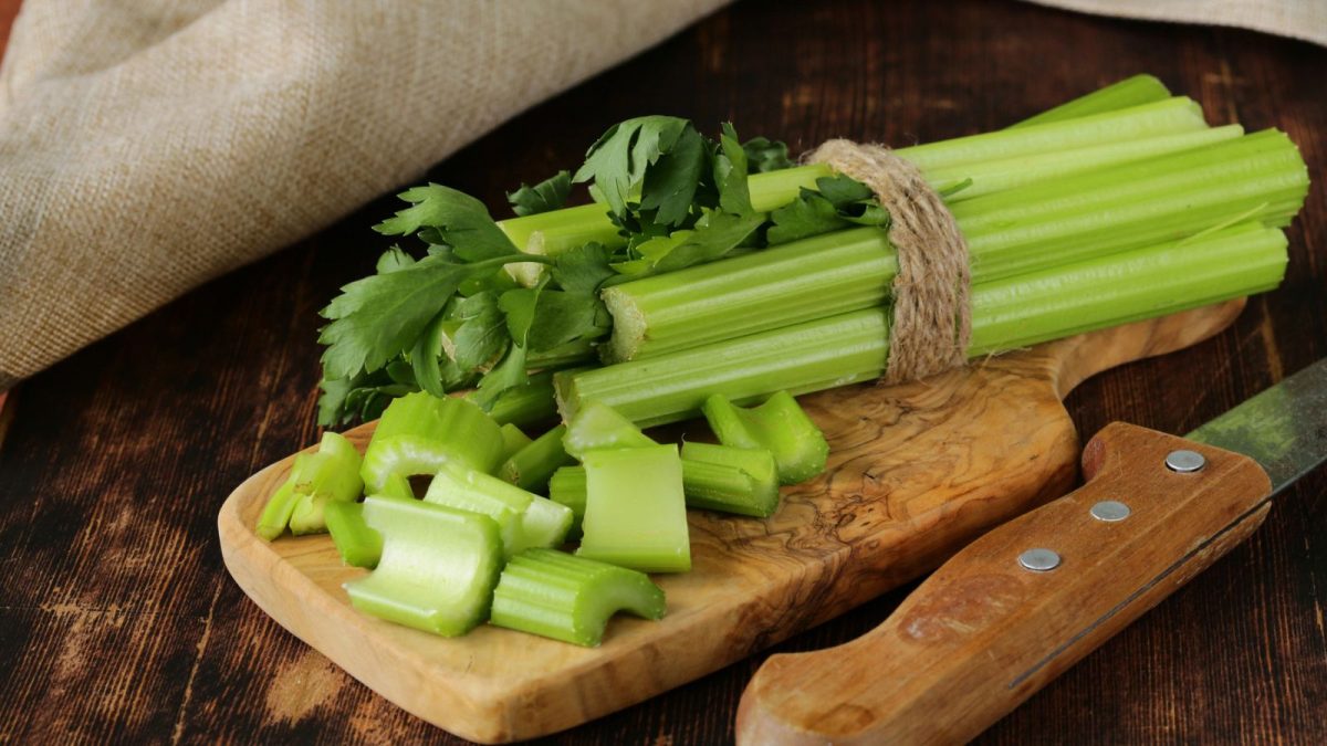 8 Everyday Foods That Are Surprisingly Low in Calories 1 celery on wooden chopping board