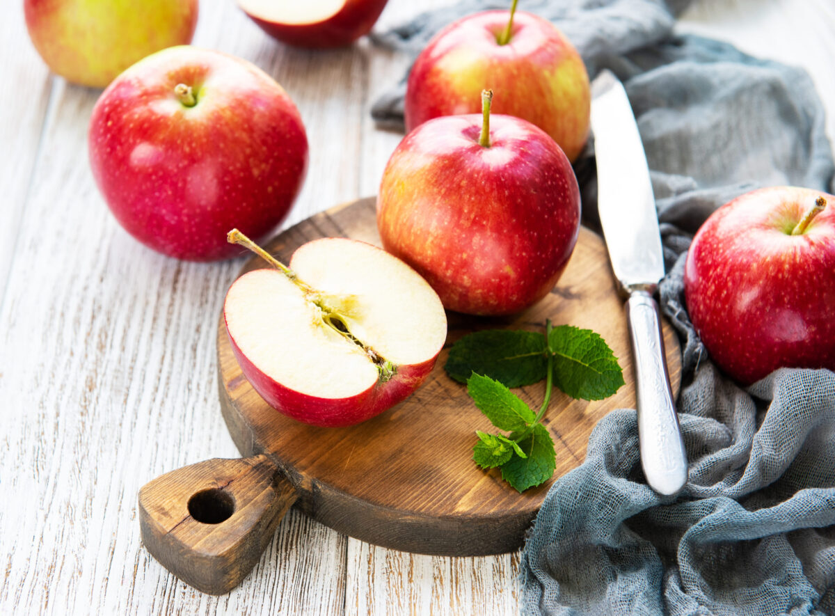 You Won’t Believe What Happens When You Eat These 10 Foods Every Day 2 Fresh red apples on a old white wooden background