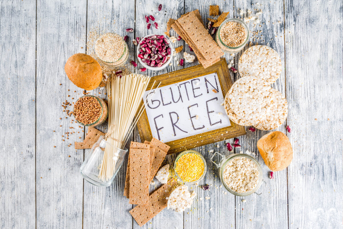 The Truth Behind Overrated Foods 4 Healthy eating, dieting, balanced food concept. Assortment of gluten free food - beans, flour, almond, corn, rice. wooden table copy space