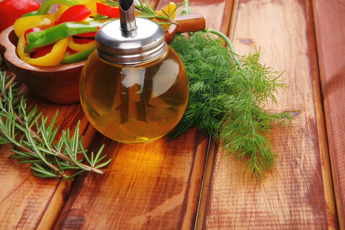 8 Common Cooking Oils You Should Never Use 1 raw peppers sliced on wooden table with sour cream