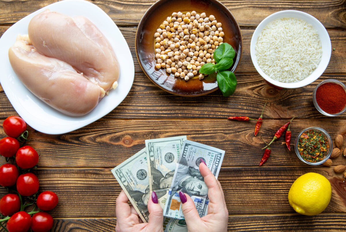 8 Things Nobody Tells You About Superfoods 2 Expensive protein rich food, USD dollar banknotes. Natural chicken meat, chick-pea and rice. Healthy nutrition.