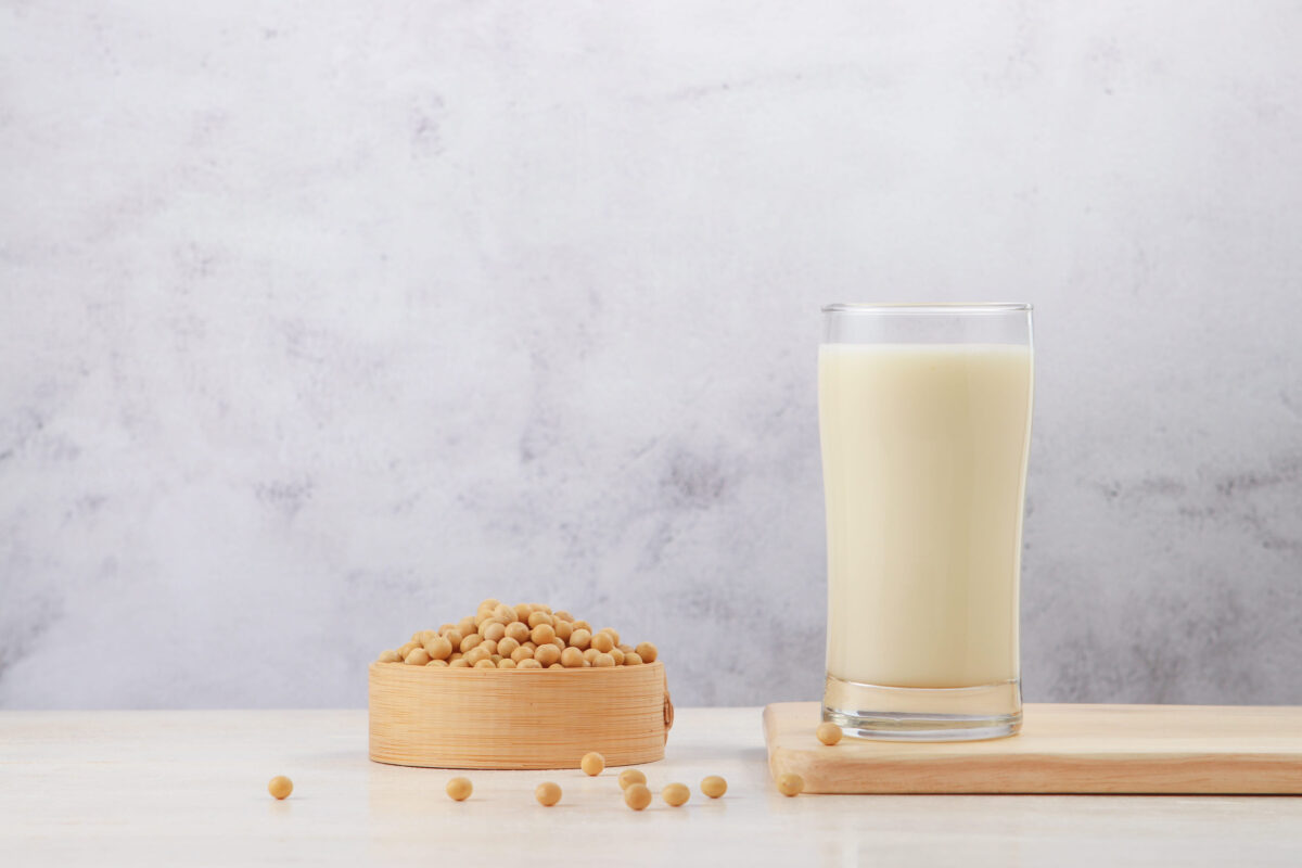 The 8 Worst Foods for Your Hormonal Health, And How They’re Affecting Your Mood 4 Soy milk and soybeans on the table