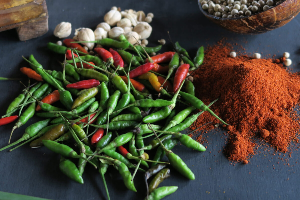 The 6 Worst Foods to Eat If You Have a Sensitive Stomach 1 Variety of spices and herbs on kitchen wooden table