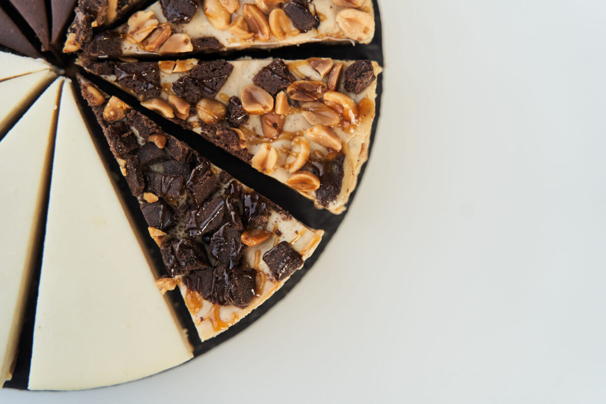 11 The Worst Pizza Toppings That Should Be Banned from Your Slice 4 Cake top view on a white background.