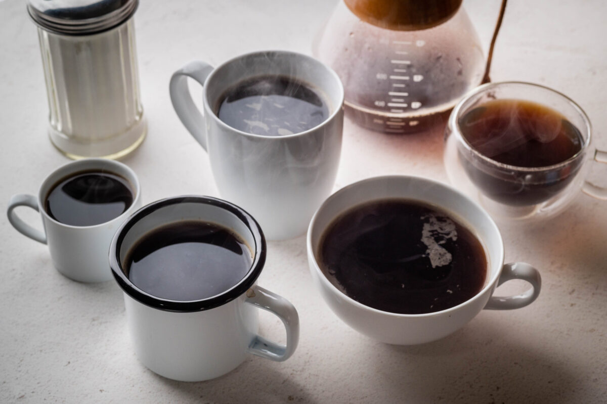 Foods You Should Never Eat Before Bed 2 coffee mugs and cups on white background