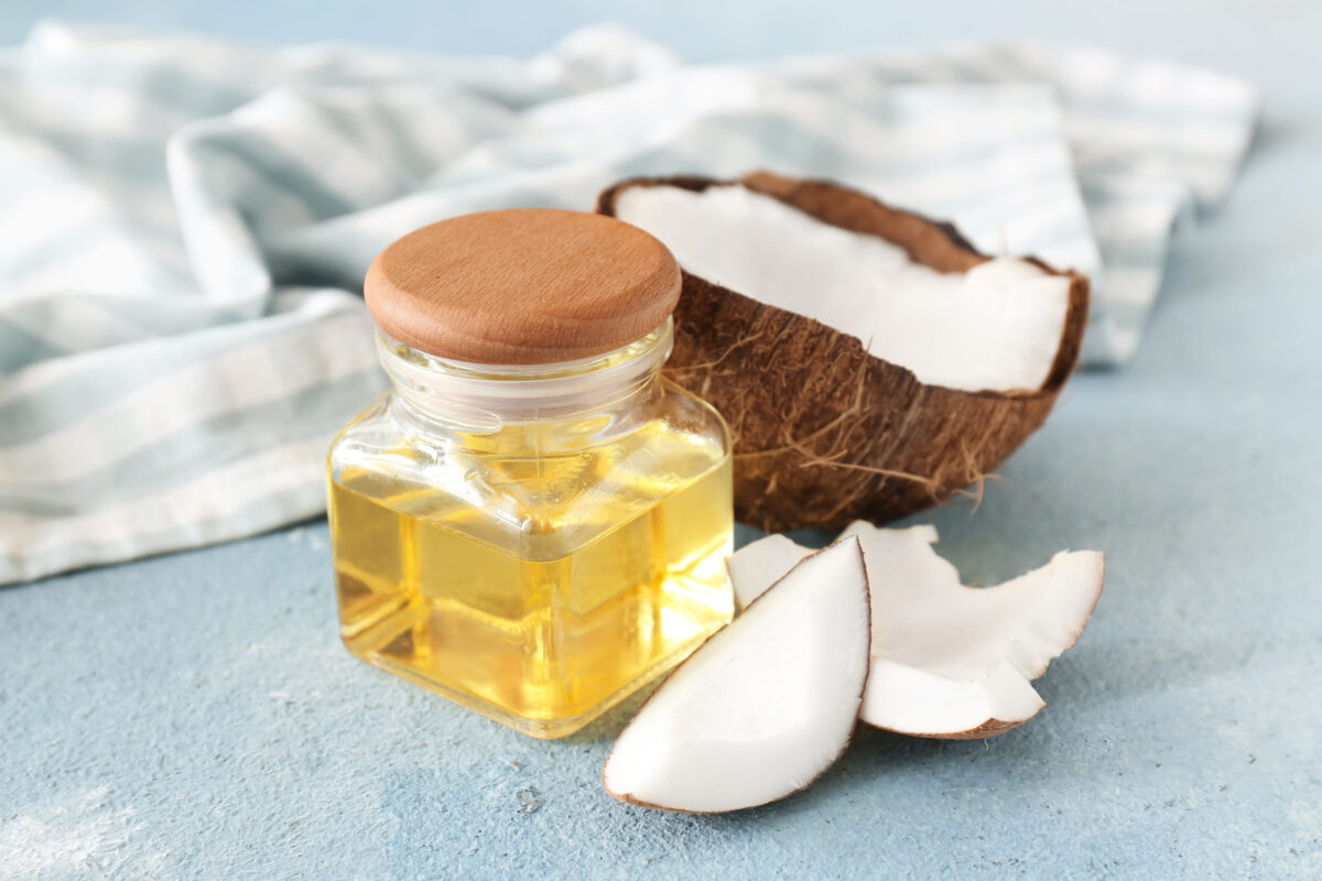 These 10 Superfoods Are Actually Super Dangerous for Your Health 3 Jar with coconut oil on table