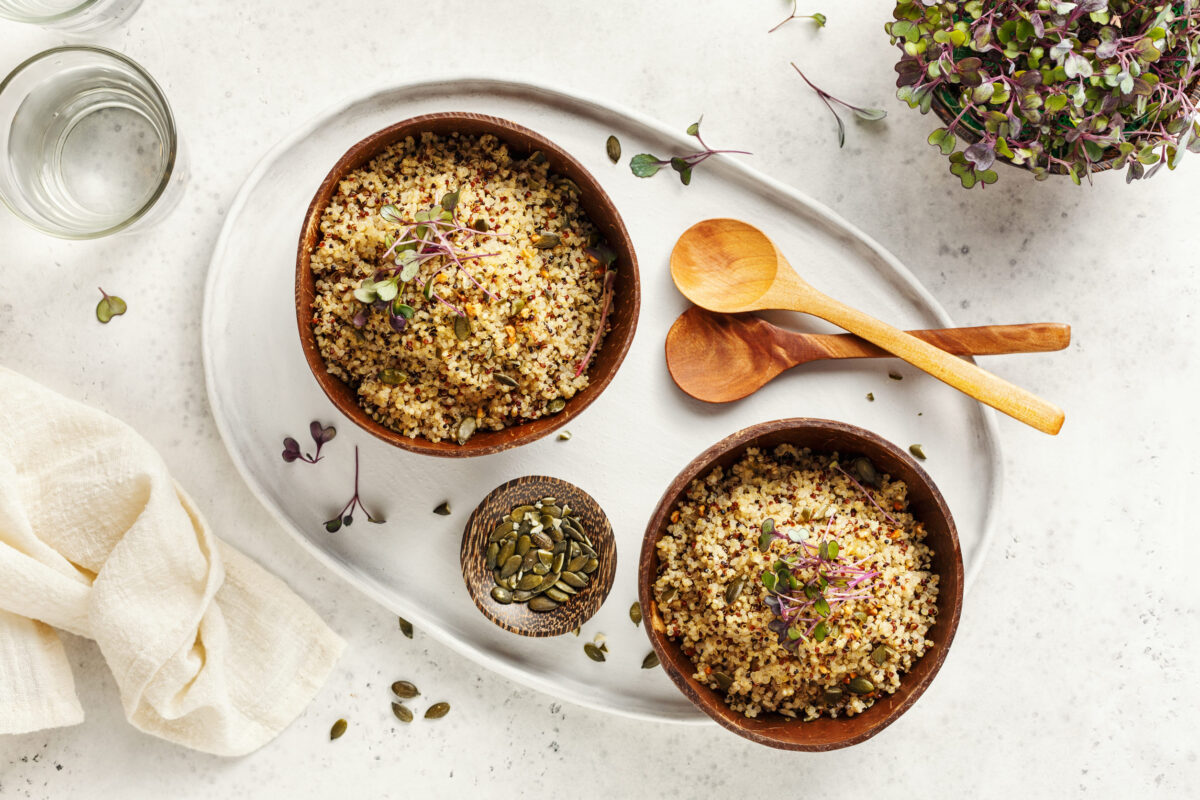 These 10 Superfoods Are Actually Super Dangerous for Your Health 4 Healthy quinoa bowls with micro greens and pumpkin seeds.