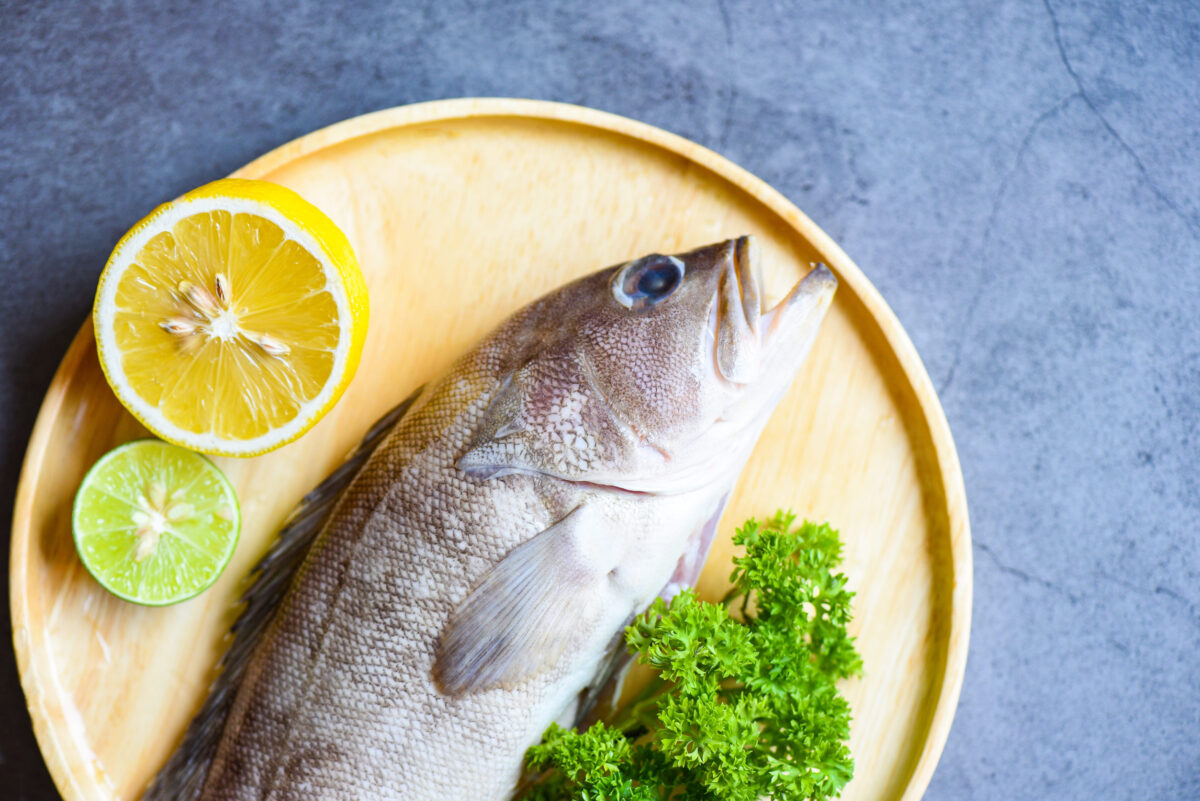 10 Underrated Fish You Should Try Before Buying Another Salmon Fillet 5 Grouper fish with lemon lime on wooden plate