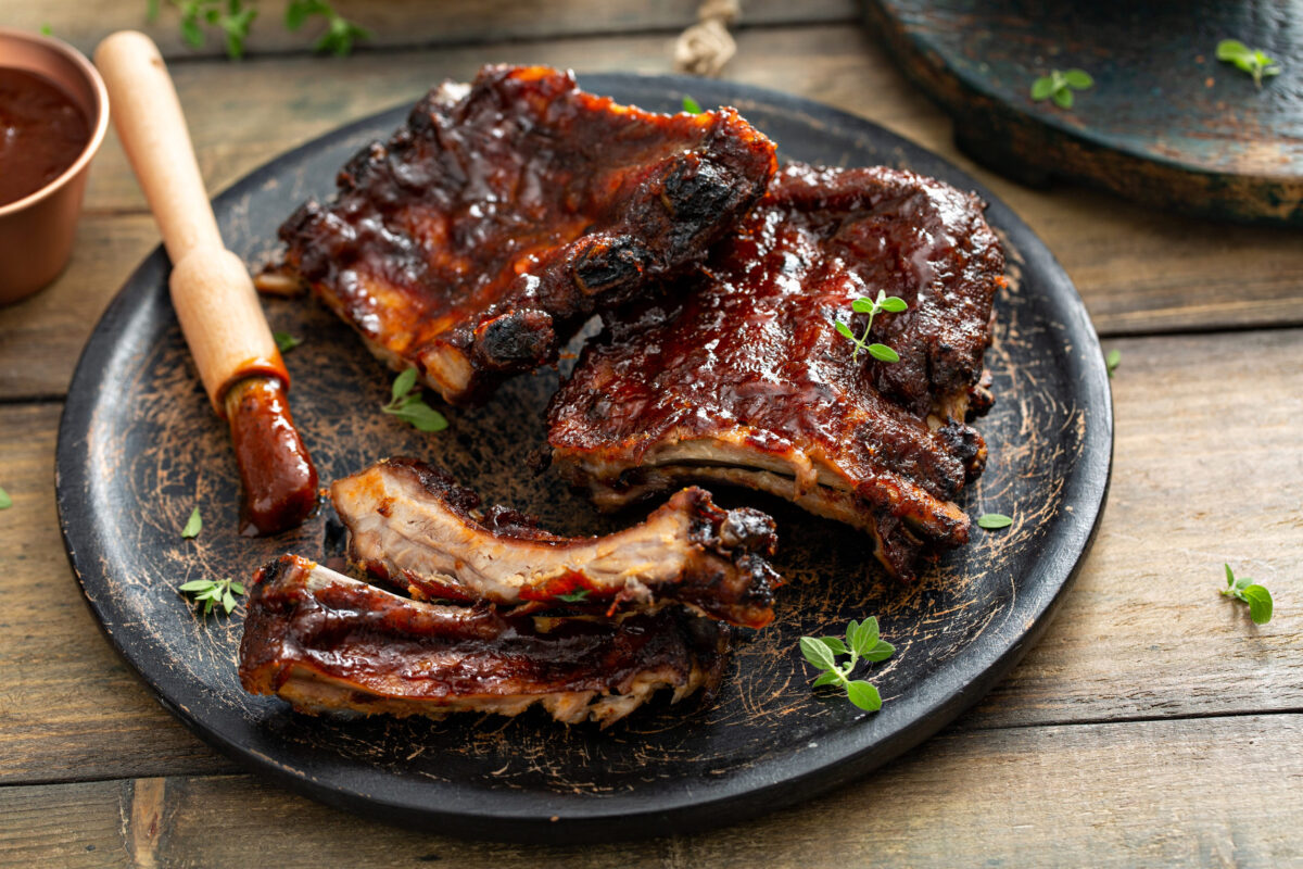 The Caloric Nightmare 2 Grilled barbeque ribs with BBQ sauce and sides