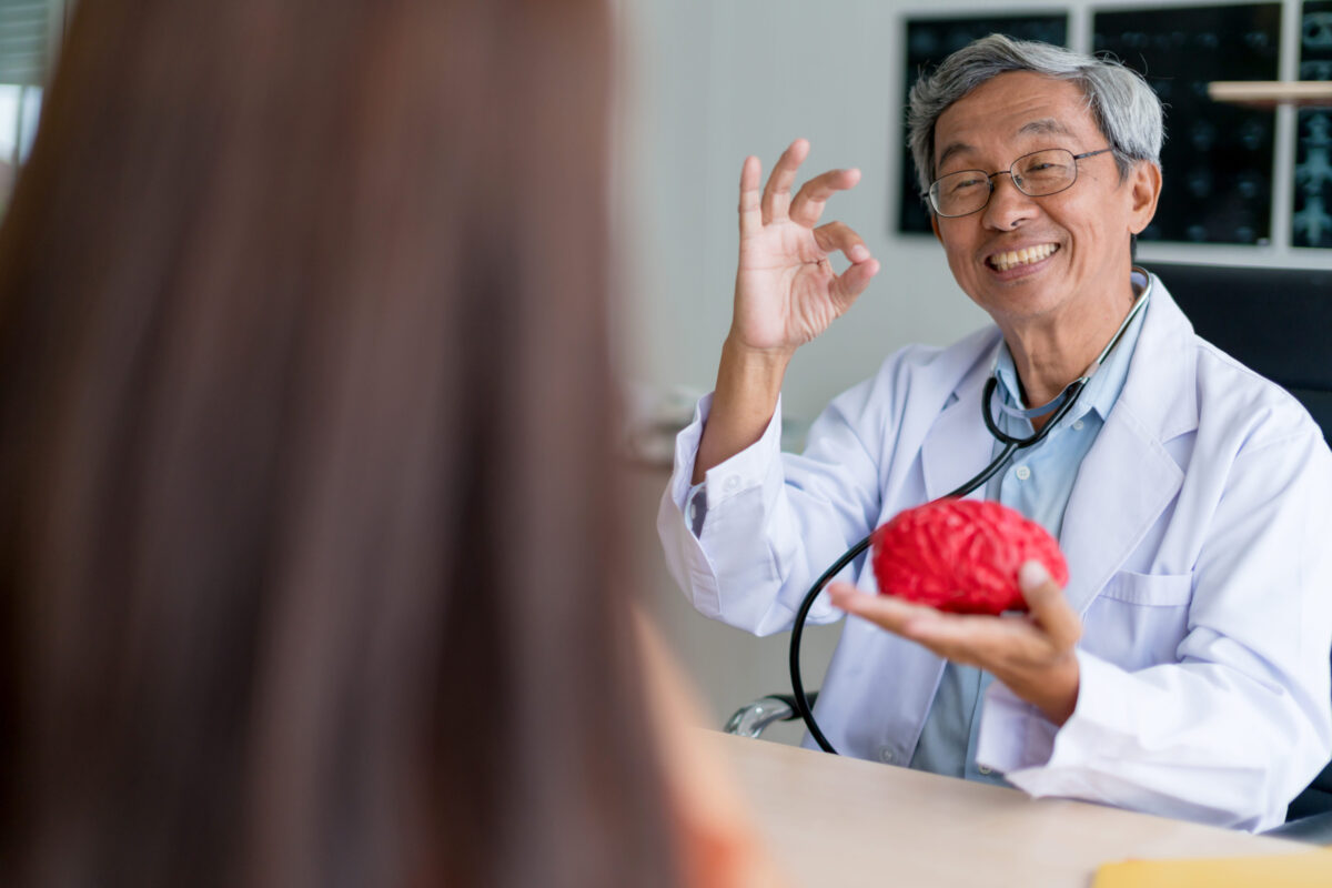 asian expert doctor examine and explain to asian woman patient with care and happiness health ideas concept