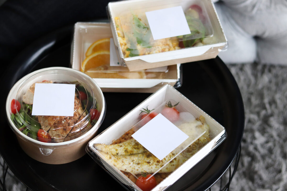 8 Common Potluck Problems and How to Solve Them Like a Pro 3 Lunch boxes with food ready for work or school, pre-cooking or diet. Baked fish, chicken with tomatoes and fruits. Healthy food delivery. Healthy restaurant food delivery, business