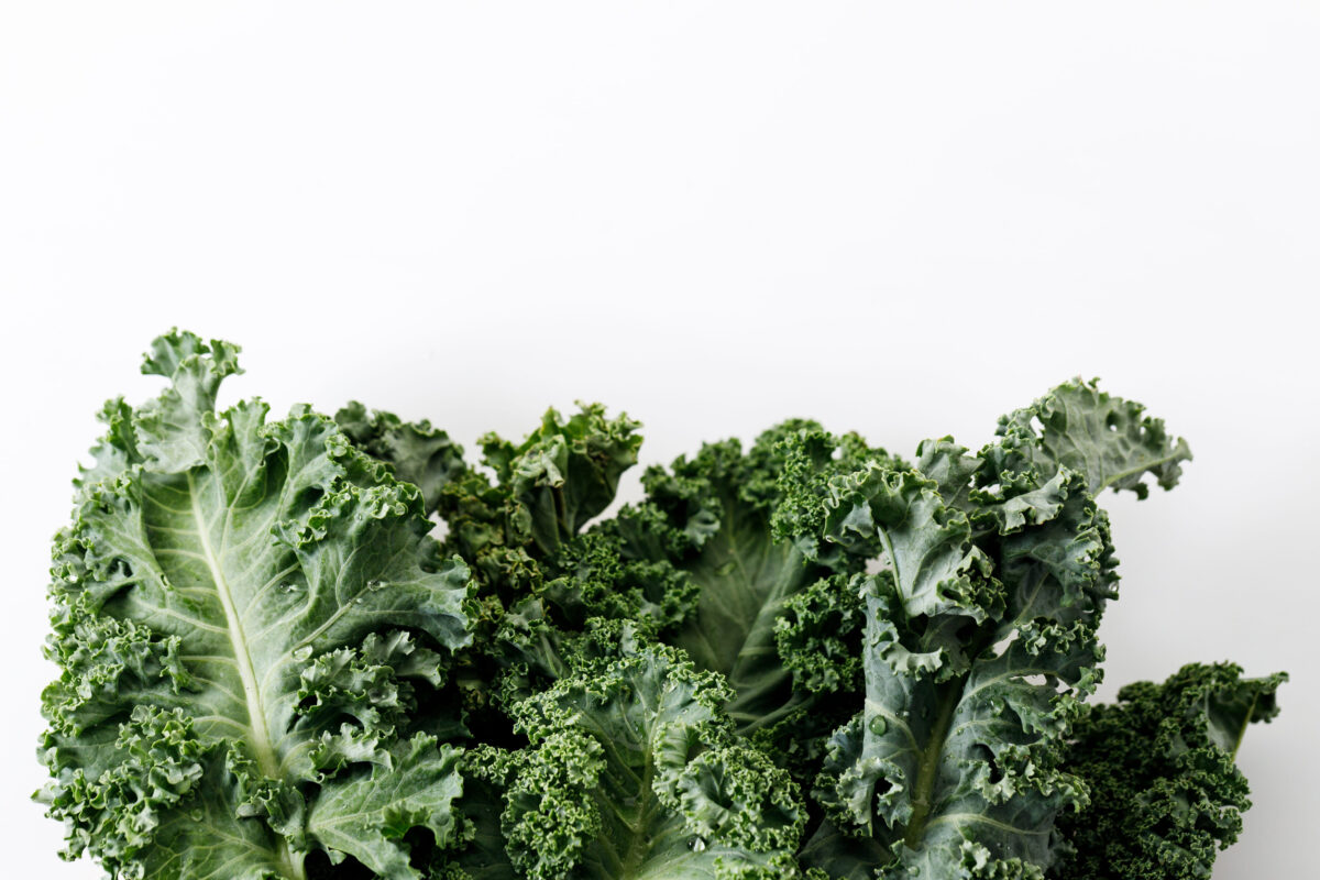 10 Vegetables You Won’t Find on My Plate—And Why I Skip Them Every Time 3 Fresh green Kale leaf salad vegetable on white background