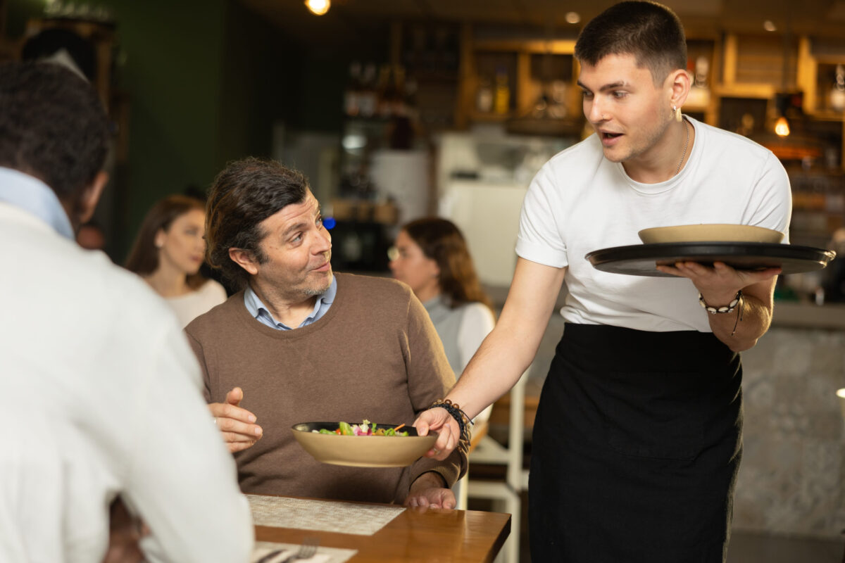 15 Cruise Dining Hacks for Better Food and Lower Costs at Sea 3 Waiter guy brings an order for men