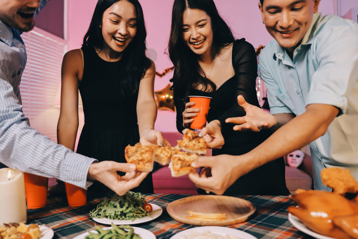 The Rude Behaviors That Can Completely Ruin a Potluck 2 Diversity, dinner and group of people toast celebration together at party. Friends, happy and celebrate with food, wine and friendship for love, support and cheers champagne at business function