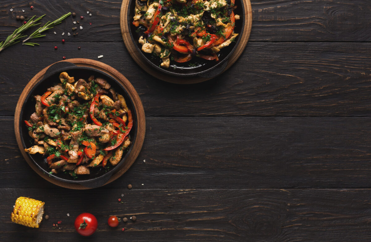 8 Lazy Dinner Recipes That Are Both Easy and Delicious 1 Collection of Dishes With Chicken and Vegetables in a Mosaic Style on Wooden Table