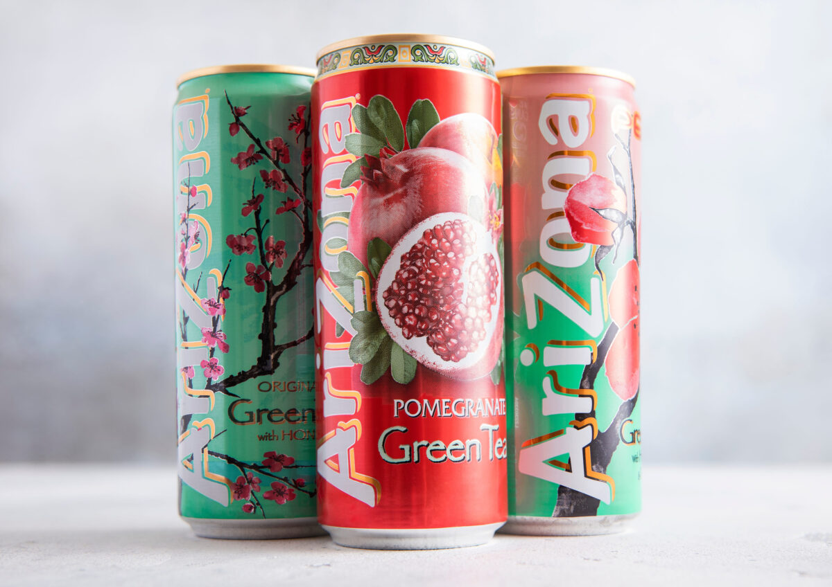 The 8 Hottest Food Trends You Should Avoid in 2026 4 LONDON,UK - MARCH 30, 2025: Three aluminum cans of Arizona iced tea drink with green, peach and pomegranate tea on table.