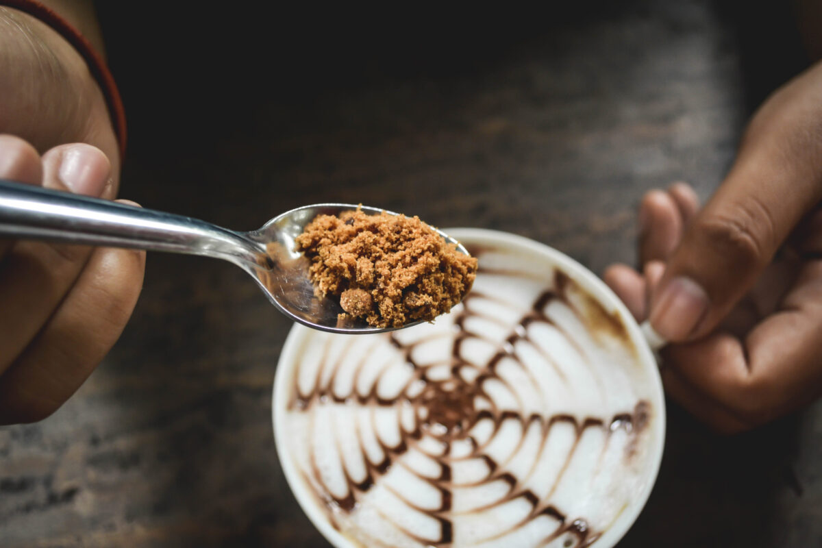 8 Deadly Food Challenges on Social Media That Could Cost You Your Life 1 Women drinking hot coffee latte in coffee shop.selective focus and hipster tone