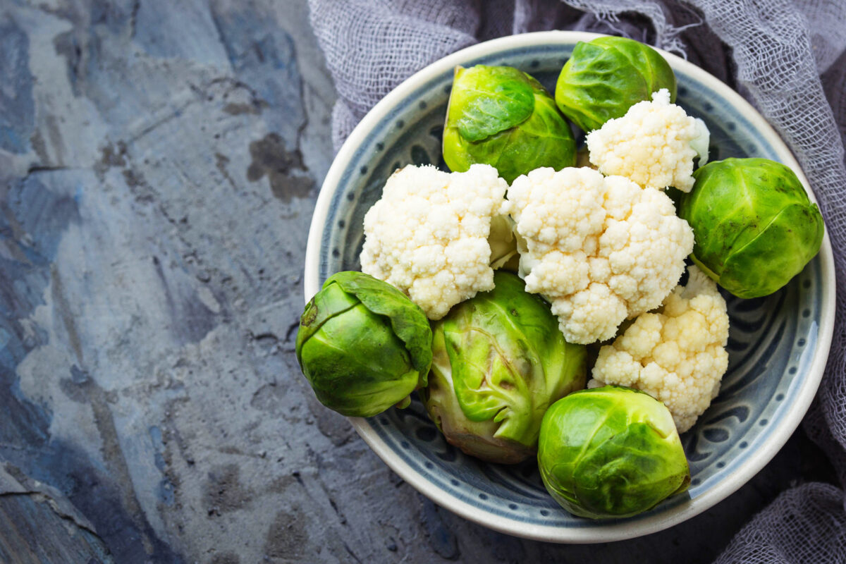 Stop Eating These 7 Foods If You Want to Avoid Constant Bloating 2 Brussels sprouts and cauliflower. Selective focus