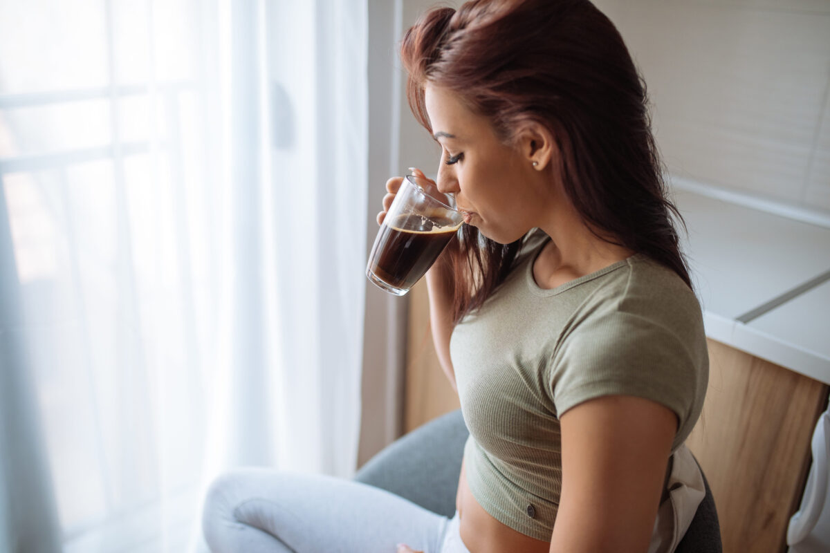 12 Breakfast Mistakes That Make Your Entire Day Worse 2 Shot of an attractive young woman enjoying drinking coffee in the morning.