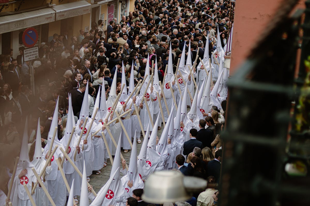 10 Facts About the Pope That Will Astonish You 3 A large procession of Nazarenos during Semana Santa in Sevilla, Spain.