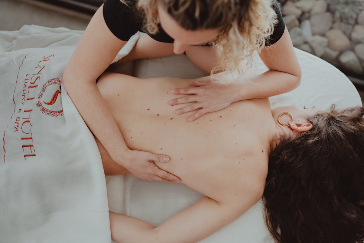 10 Everyday Activities That Can Alter Consciousness and Perception 4 A soothing massage session at a luxury hotel spa, capturing relaxation and wellness.