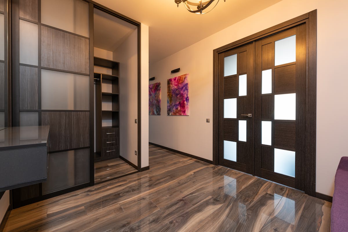10 Home Features That Are Actually Turning Buyers Away in 2026 2 Contemporary room interior with closet on floor reflecting door against paintings on wall in light house
