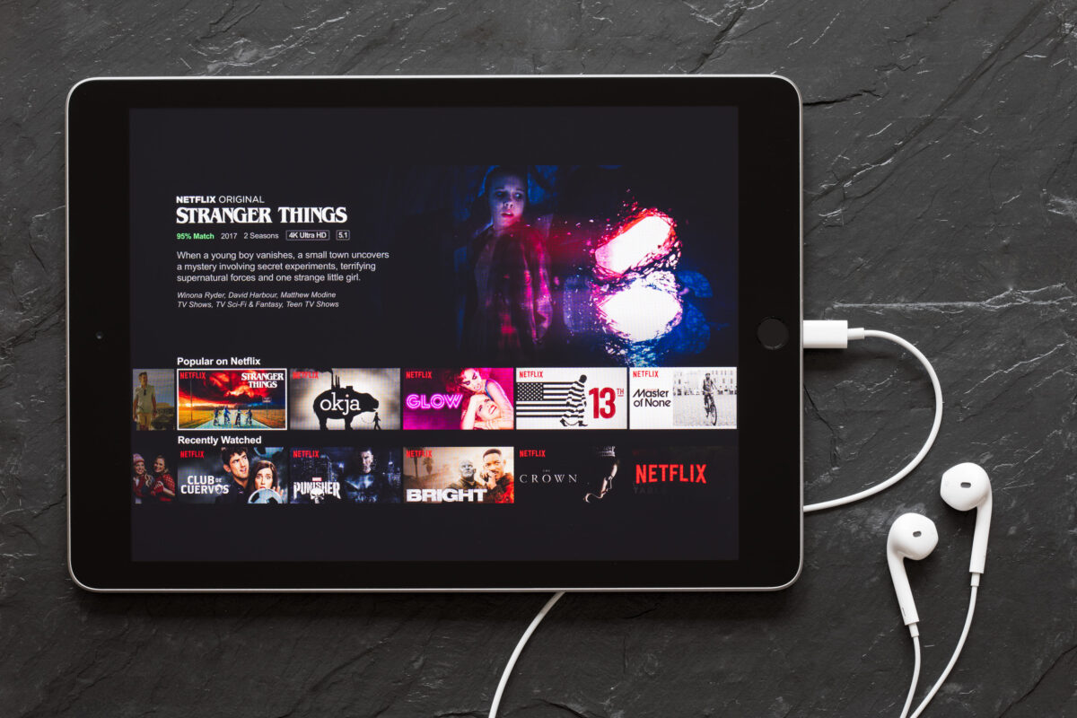 Riga, Latvia - March 25, 2018: iPad with Netflix app on the screen.