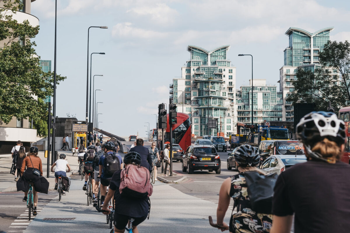 London, UK - July 16, 2019: Cyclists on Vauxhall Bridge in London, during rush hour, selective focus. Cycling is a popular way of getting around the city.