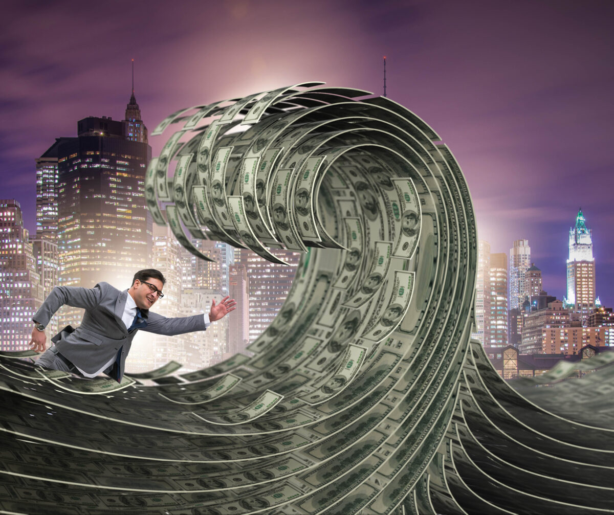 10 Criminals Who Fooled Everyone Before the Truth Finally Came Out 1 Businessman swimming in the sea of dollar money