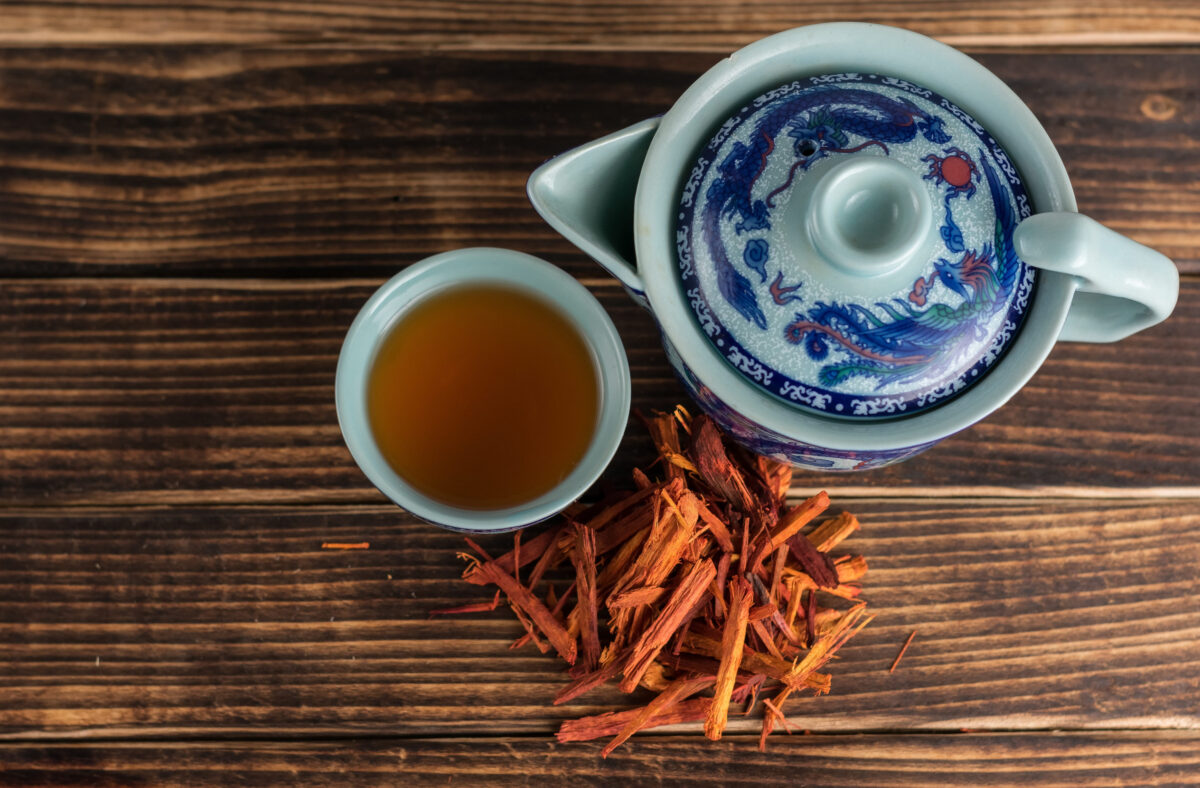 Chinese tea cup accompanied by red tea