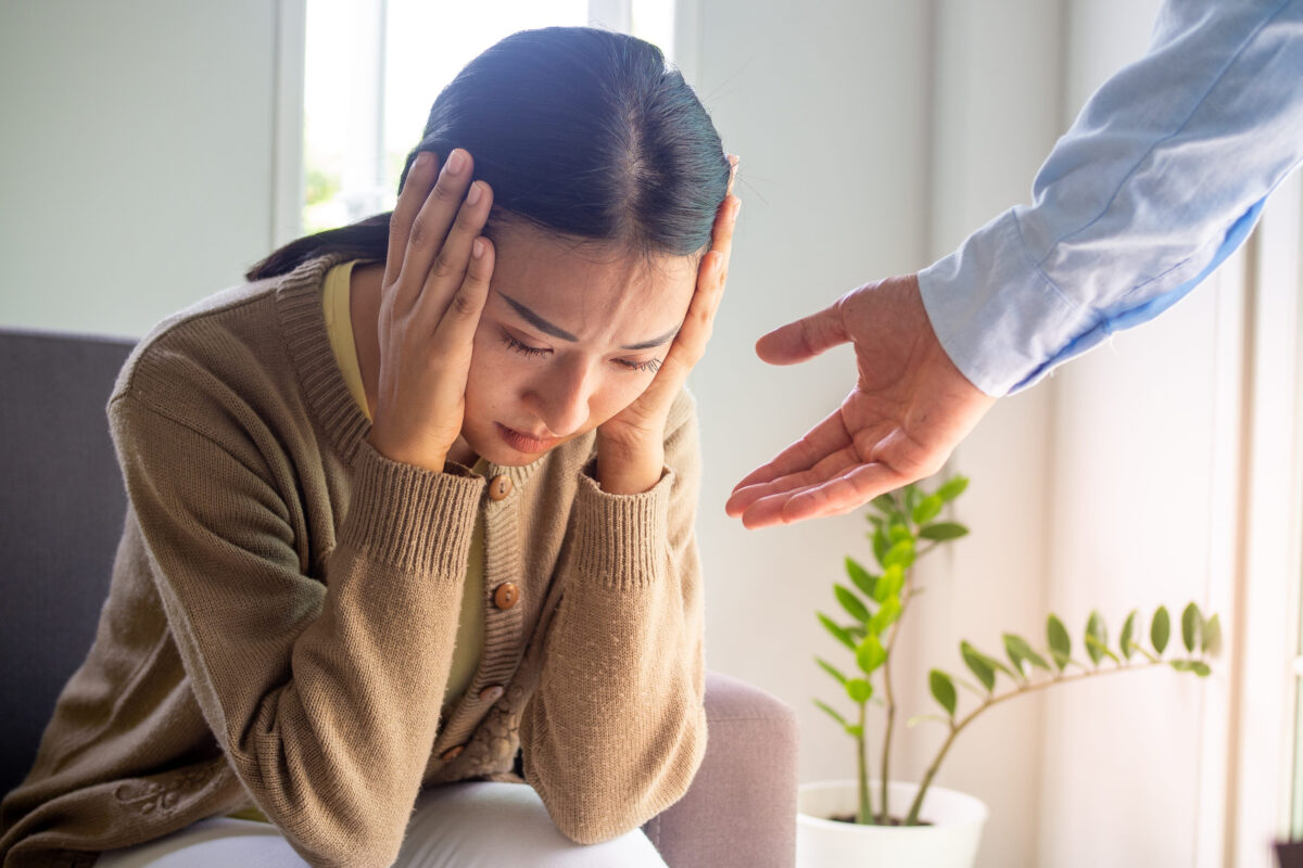 Female patients with mental and physical illnesses and psychiatrists. The psychiatrist is encouraging and is ready to help, preparing for the treatment of mental symptoms and depression.