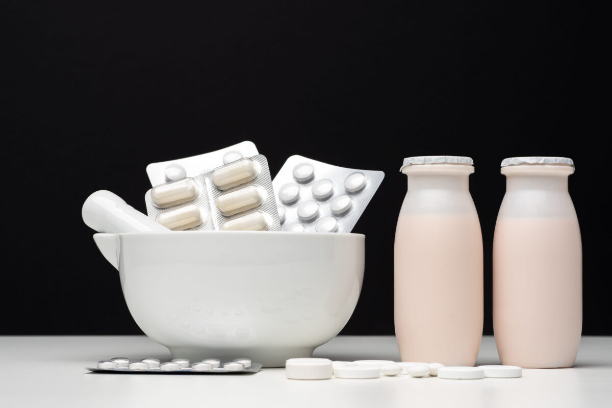 Black and white concept of probiotics and prebiotics. Medications to restore intestinal flora. The health of the gastrointestinal tract. Products with probiotics.