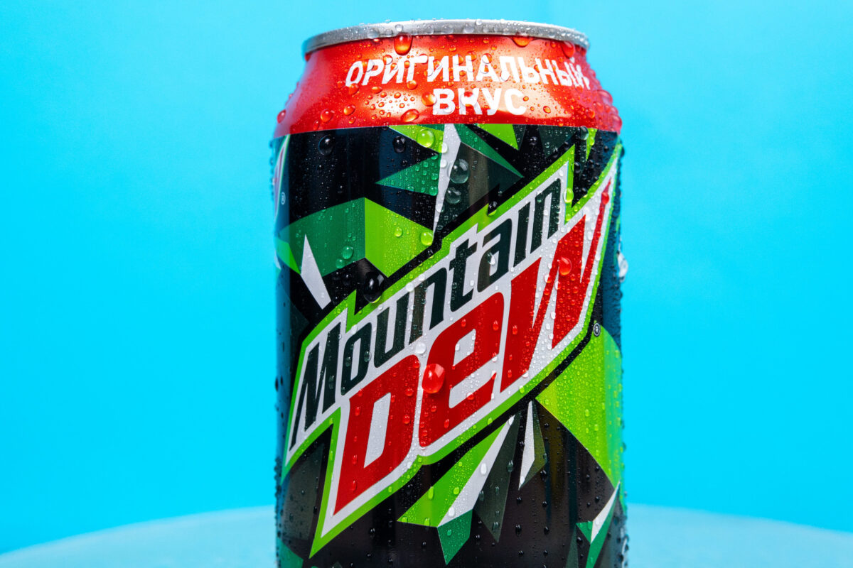 8 American Snacks Totally Forbidden In Europe 1 Tyumen, Russia-December 10, 2020: Mountain Dew PepsiCo can logo with water drops close up. selective focus