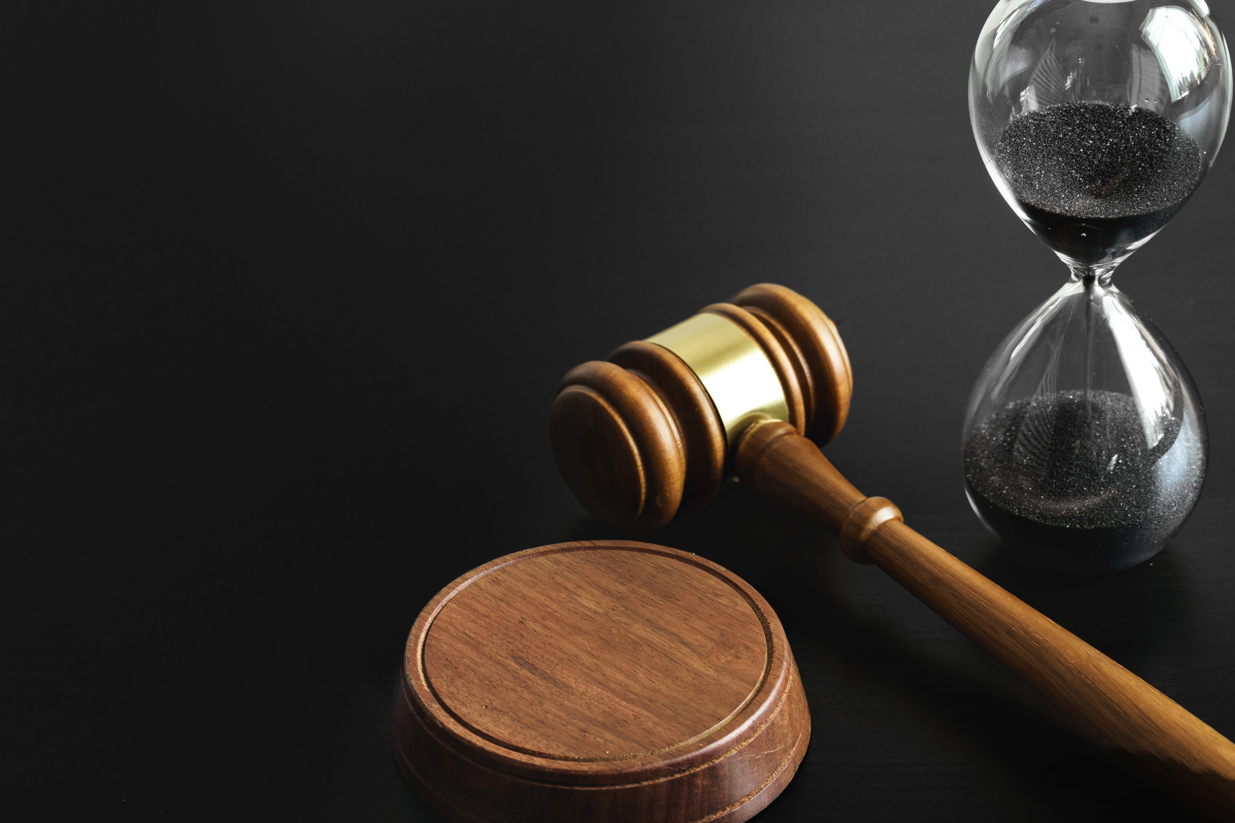The Hidden Servers Behind a $63 Million Cybercrime Scheme Targeting Americans 2 Hourglass and judge gavel on table