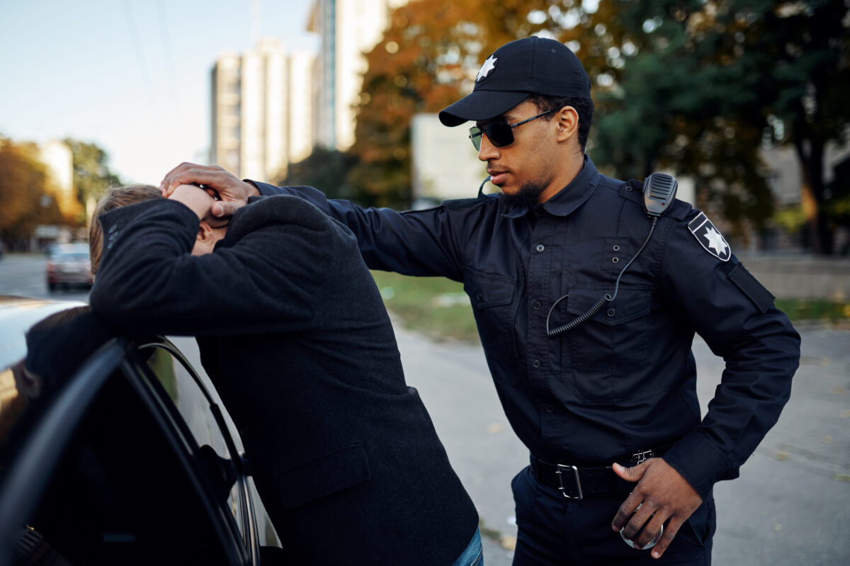 9 Ways Florida’s Quiet Immigration Arrest Surge Could Change Everyday Life Across the State 1 Police patrol arrests male driver near the car