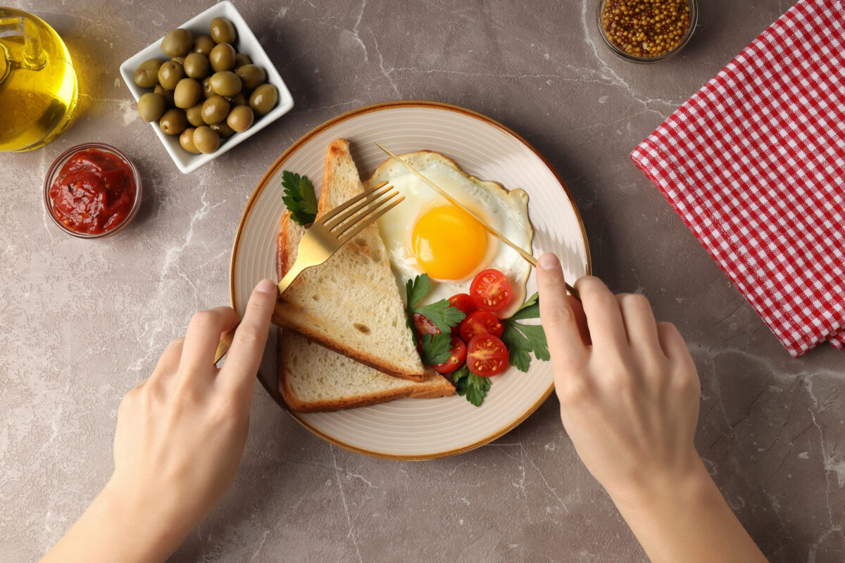 Concept of tasty breakfast on gray textured background