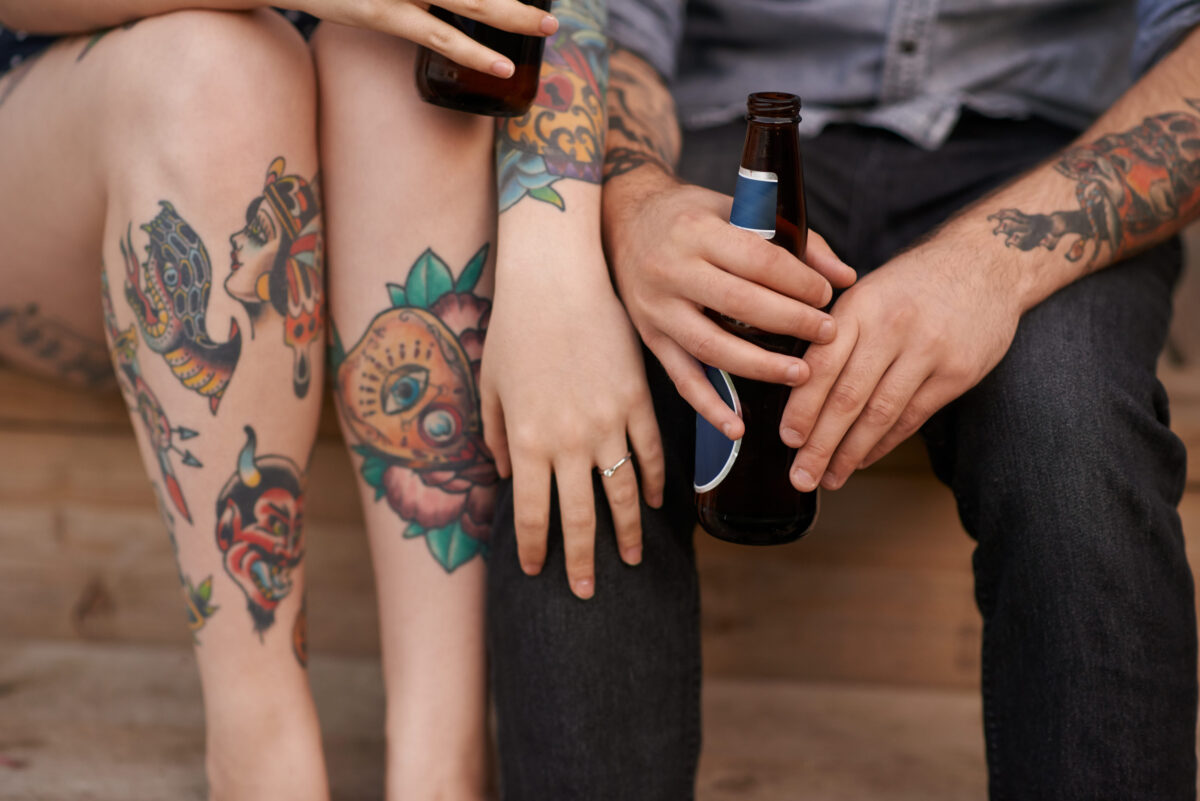 10 Worst Tattoos People Regret Having 2 Tattoos are another form of body language. Cropped shot of a couple with tattoos on their bodies and drinks in the hands.