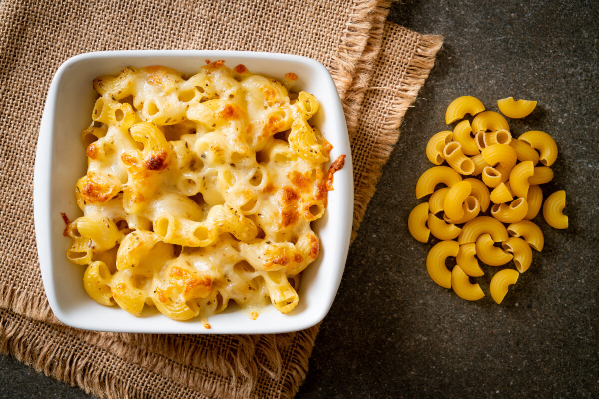 American mac and cheese, macaroni pasta in cheesy sauce