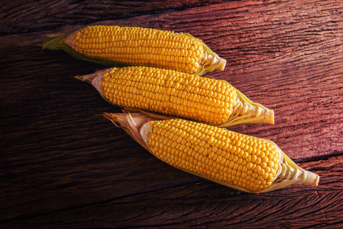 10 Kitchen Staples with Alleged Occult Abilities 5 Fresh sweet corn on wooden table