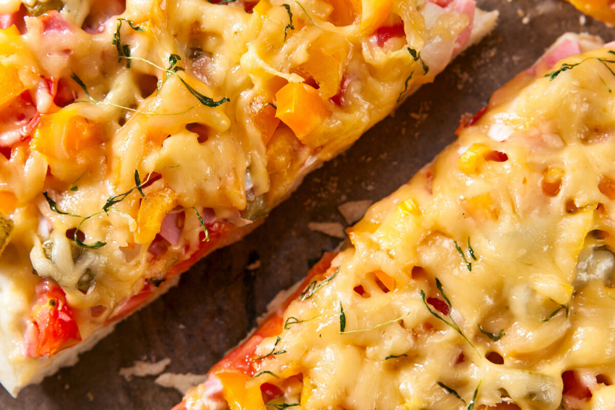Home baked pizza with tomatoes, sausage and  paprika