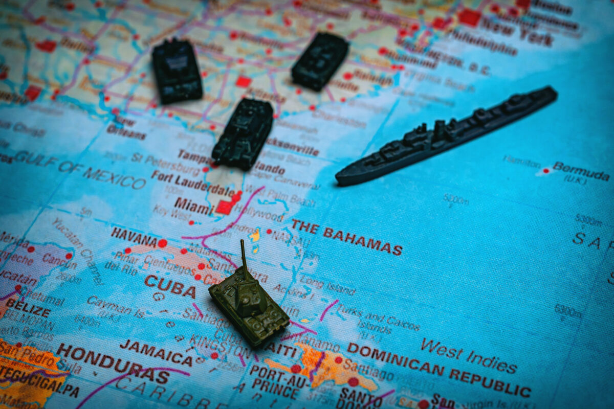 Military forces and maritime security on Cuba and USA map.