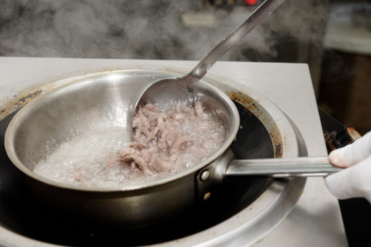 8 Common Cooking Mistakes That Are Quietly Ruining Your Meals 3 Frying lamb slices in oil, close-up
