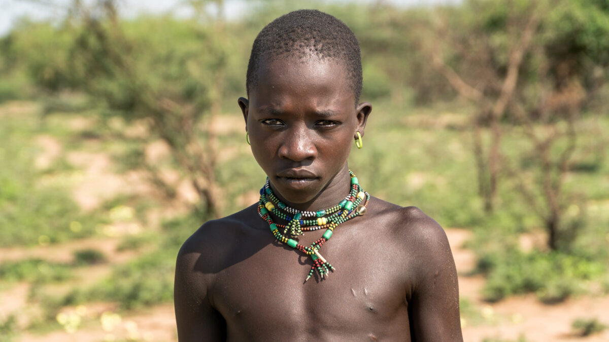 8 Most Dangerous Countries in the World Right Now That You Should Never Underestimate 4 Omo, Ethiopia - September 2017: Portrait of an unidentified Ethiopian tribal boy