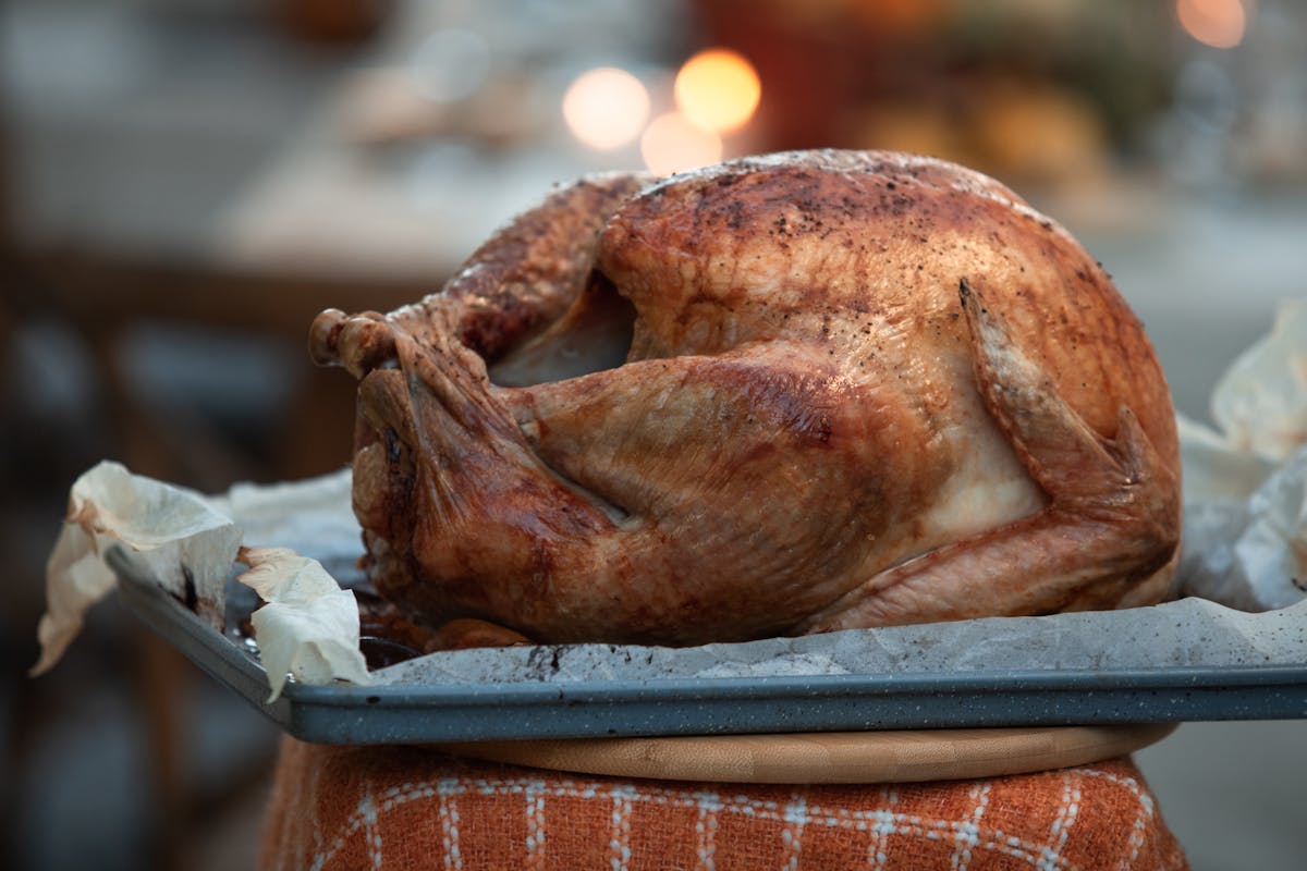 The forgotten 2020 Thanksgiving debate that came back to challenge Francesca Hong 2 A perfectly roasted whole turkey on a tray, ready for Thanksgiving dinner.