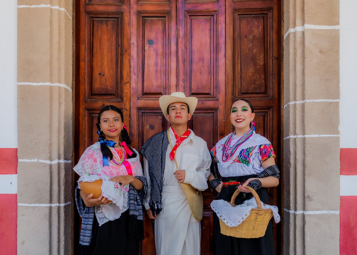 A vibrant display of traditional Mexican folk costumes in Huauchinango, Puebla, Mexico.
